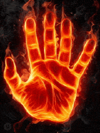 A Hand Is Covered In Flames And Looks Like It 'S On Fire GIF