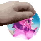 a hand is holding a cd with a picture of a woman on it