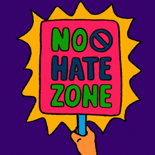 A Hand Is Holding A Sign That Says " No Hate Zone " GIF