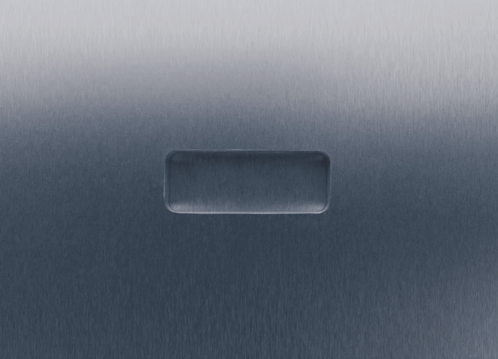 a hand is pressing a button on a gray surface