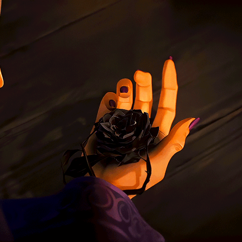 A Hand With Purple Nail Polish Is Holding A Dark Rose GIF