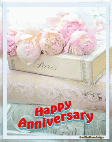 a happy anniversary card with flowers and a book