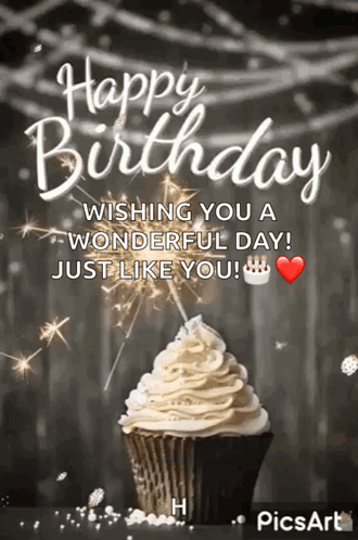 A Happy Birthday Greeting Card With A Cupcake And Sparklers . GIF