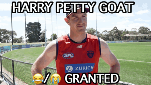 A Harry Petty Goat Poster With A Man Wearing A Red Jersey GIF