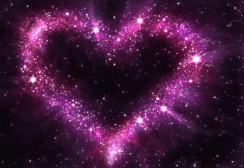 A Heart Made Of Purple And Pink Stars On A Dark Background GIF