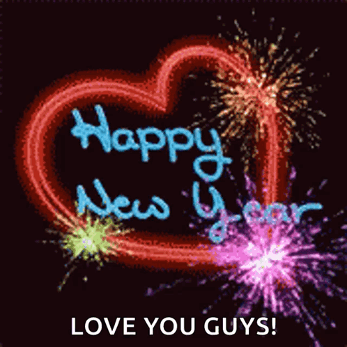 A Heart Shaped Fireworks Display With The Words Happy New Year Written On It GIF
