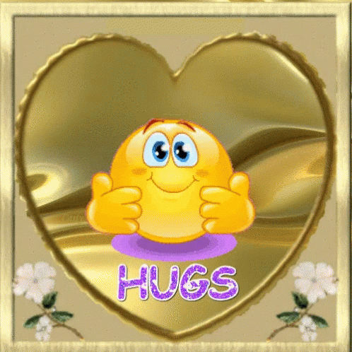A Heart Shaped Frame With A Smiley Face And The Words Hugs On It GIF