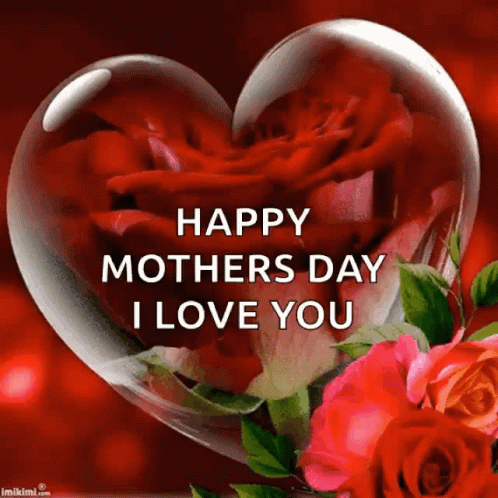 A Heart Shaped Glass Container Filled With Red Roses With The Words Happy Mothers Day I Love You GIF