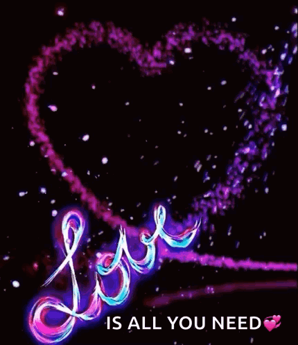 a heart with the words `` love is all you need '' written on it .