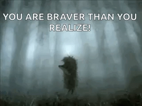 A Hedgehog Is Standing In The Middle Of A Foggy Forest With The Words `` You Are Braver Than You Realize '' . GIF