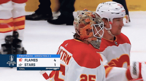 A Hockey Game Between The Flames And The Stars Is Tied 2-2 GIF