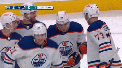 A Hockey Game Is Being Played Between The Edmonton Oilers And The Toronto Maple Leafs GIF