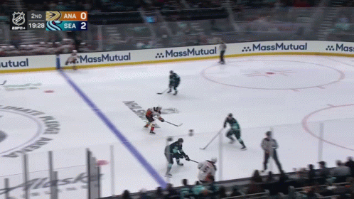 A Hockey Game Is Being Played In A Stadium With Ads For Massmutual On The Ice GIF
