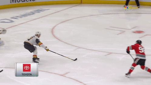 A Hockey Game Is Being Played In Chicago GIF