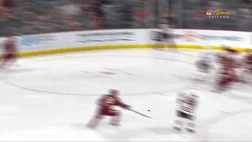 A Hockey Game Is Being Played In Chicago GIF
