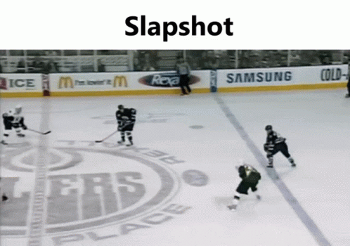 A Hockey Game Is Being Played In Front Of A Banner That Says Samsung GIF