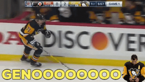 A Hockey Game Is Being Played In Front Of A Discover Ad GIF
