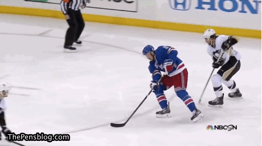 A Hockey Game Is Being Played In Front Of A Nbc Advertisement GIF