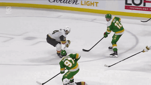 A Hockey Game Is Being Played In Front Of A Us Bank Advertisement GIF