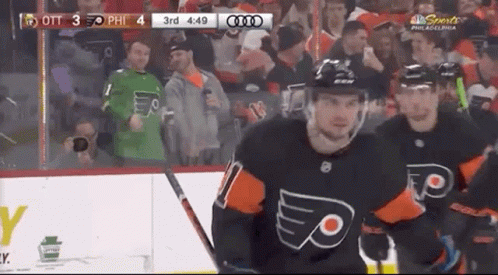 A Hockey Game Is Being Played In Philadelphia Between The Flyers And The Rangers GIF