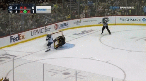A Hockey Game Is Being Played On A Ice Rink Sponsored By Fedex And Upmc GIF