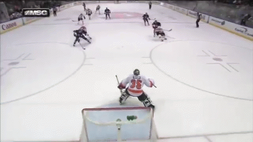 A Hockey Game Is Being Played On A Msg Channel GIF