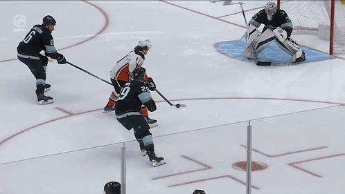 A Hockey Game Is Being Played On A Rink With The Word Son On The Ice GIF