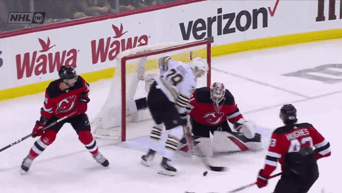 A Hockey Game Is Being Played Sponsored By Verizon GIF