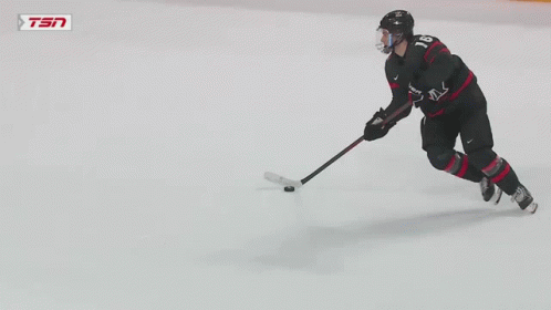 A Hockey Game Is Being Played With A Tsn Logo On The Ice GIF