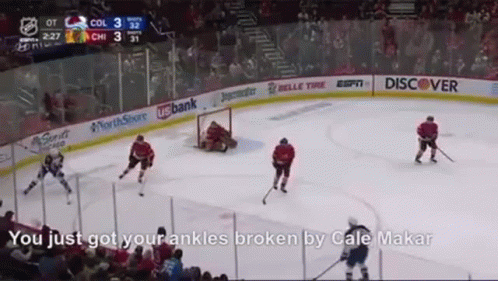 a hockey game is being played with the words " you just got your ankles broken by cale makar " on the bottom