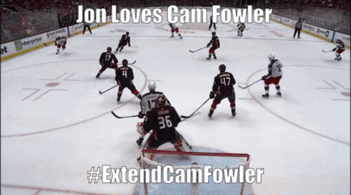 A Hockey Game With Jon Loves Cam Fowler Written In The Corner GIF