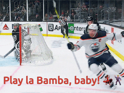 A Hockey Game With The Words Play La Bamba Baby On The Ice GIF