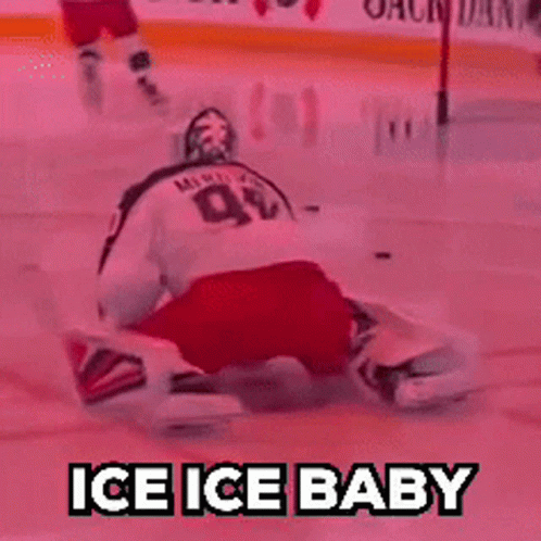 A Hockey Goalie Is Laying On The Ice With The Words Ice Ice Baby Behind Him GIF