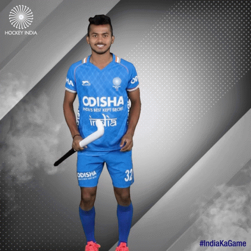 A Hockey Player From India Is Holding A Stick GIF