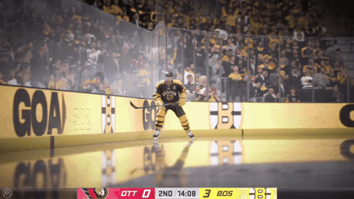 A Hockey Player In A Bruins Jersey Stands On The Ice GIF