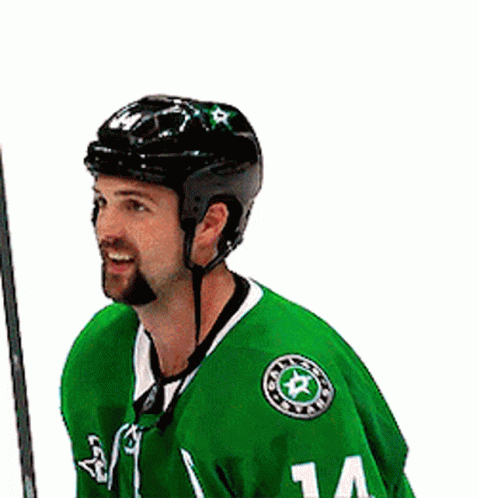 A Hockey Player In A Green Jersey With The Number 14 On It GIF