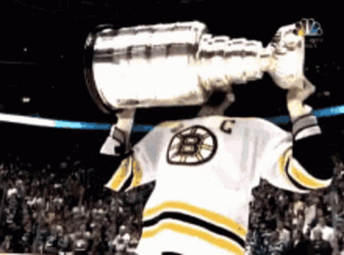 A Hockey Player In A Jersey With The Letter B On It GIF