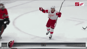 A Hockey Player In A Red And White Uniform With The Letter B On The Bottom GIF