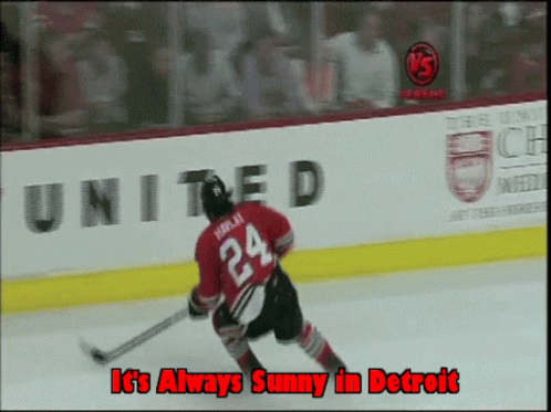 A Hockey Player In A Red Jersey With The Number 24 On It GIF