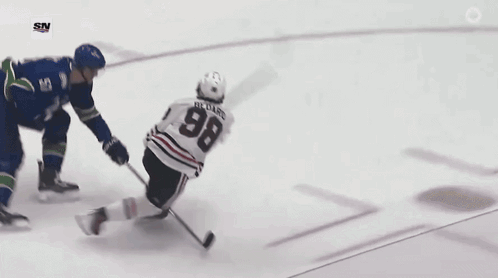 A Hockey Player Is Laying On The Ice With The Sn Logo On The Bottom Right GIF