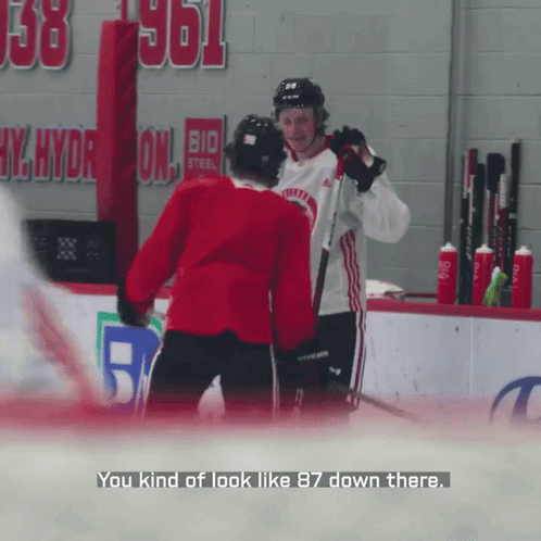 A Hockey Player Is Talking To Another Player With The Words " You Kind Of Look Like 87 Down There " GIF