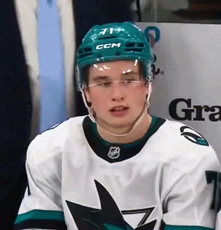 A Hockey Player Wearing A Ccm Helmet And Glasses GIF