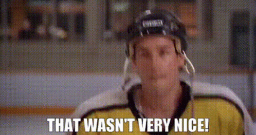 A Hockey Player Wearing A Helmet And A Yellow Jersey Is Saying `` That Wasn 'T Very Nice '' . GIF