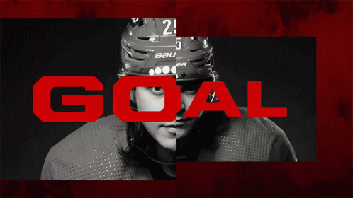 A Hockey Player Wearing A Helmet That Says Bauer Is Shown In A Black And White Photo GIF