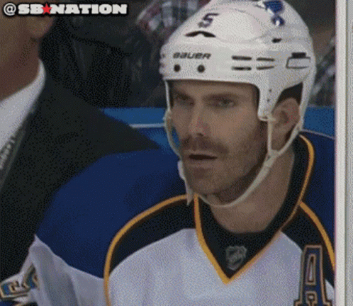 A Hockey Player Wearing A Helmet That Says Bauer GIF