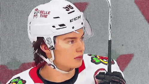 A Hockey Player Wearing A Helmet That Says Ccm GIF
