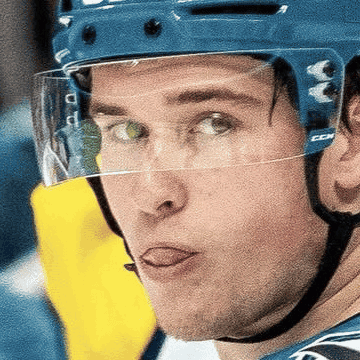 A Hockey Player Wearing A Helmet That Says Ccm GIF