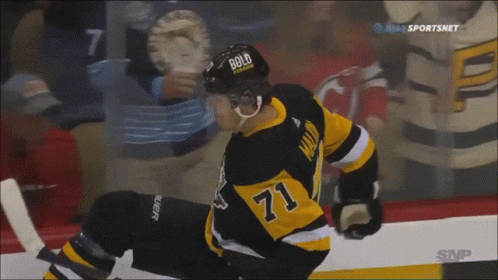 A Hockey Player Wearing A Helmet With Bold On It GIF