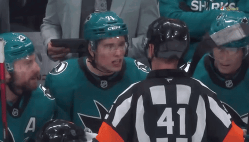 A Hockey Player Wearing A Helmet With The Letters Ccm On It GIF