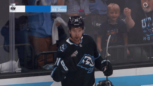 A Hockey Player Wearing A Jersey That Says 88 On It GIF